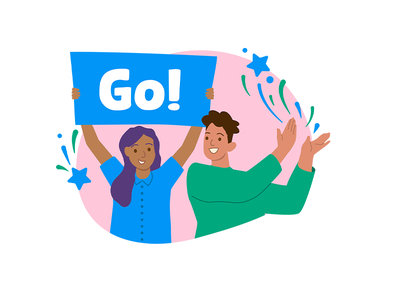 Man and woman cheering and holding sign saying 'Go!'