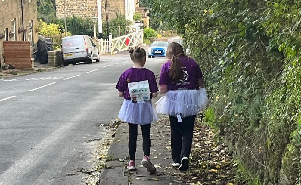 Esther and friend walking the Sue Ryder Starlight Hike Worth Valley