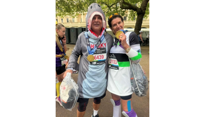 Jane and Mark posing after the London Marathon