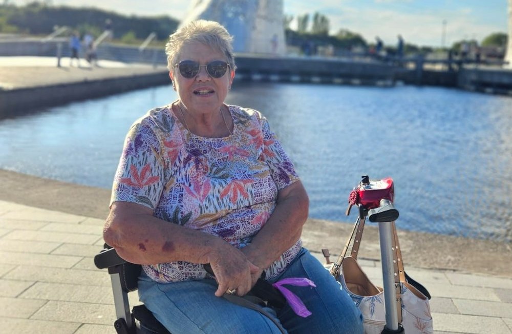 Rosemary Stephenson on a wheelchair outdoor