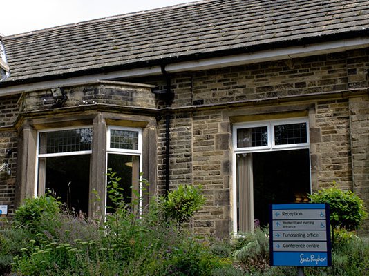 The front entrance of Sue Ryder Manorlands Hospice