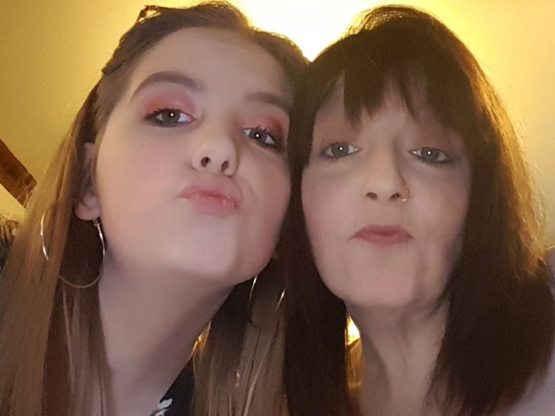 Zoe's younger sister with her mum