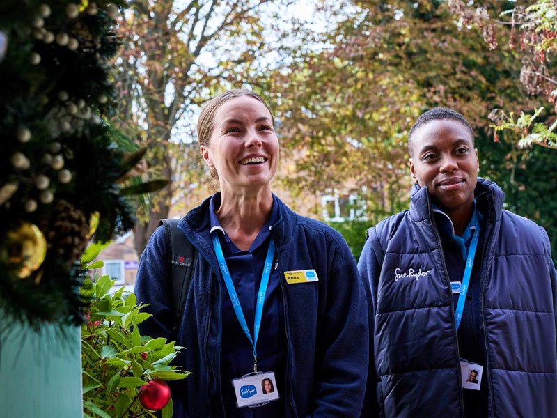 Image of two Sue Ryder Nurses at a home visit