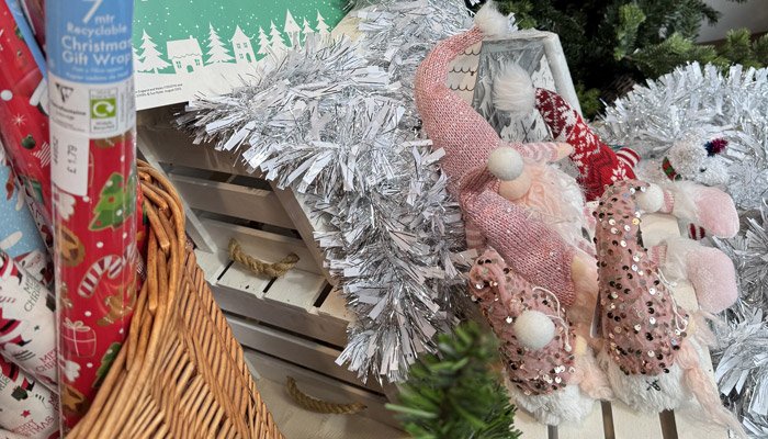 Christmas decorations, toys and gifts in a hamper